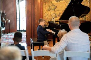 student playing the piano